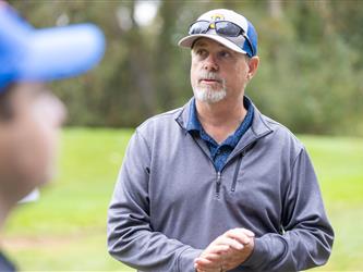 attendee at golf tournament