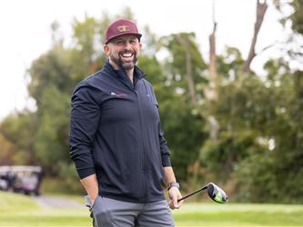 attendee at golf tournament