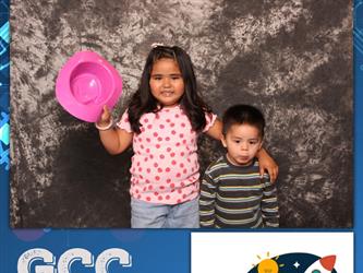 children posing for photo booth