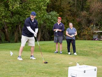 golf player preparing to swing