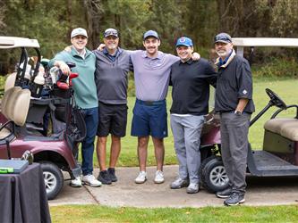 attendees at golf tournament