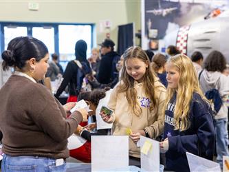 woman speaking into mic