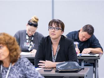 gcc con attendees listening to speaker